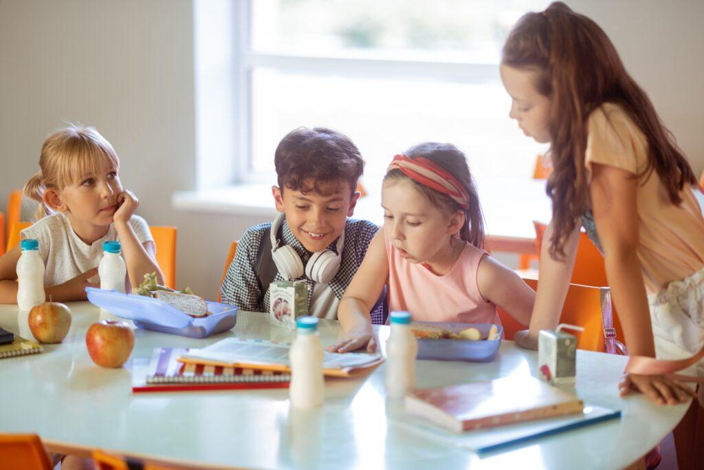children feeling good while spending time canteen together 1 Group of kids are studying together