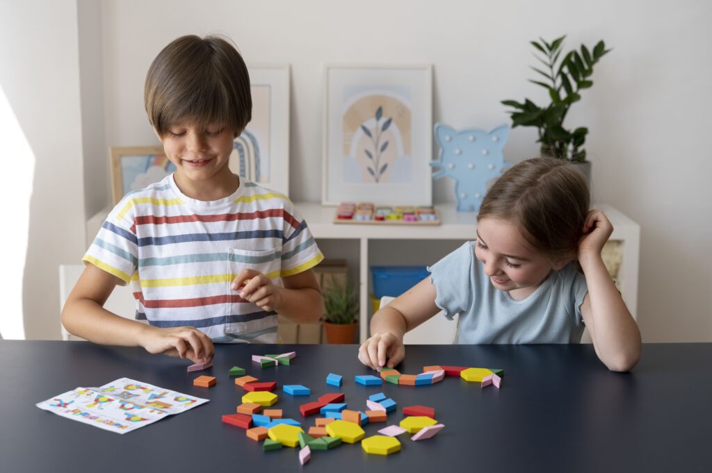 kids making puzzle together front view kids making puzzle together front view
