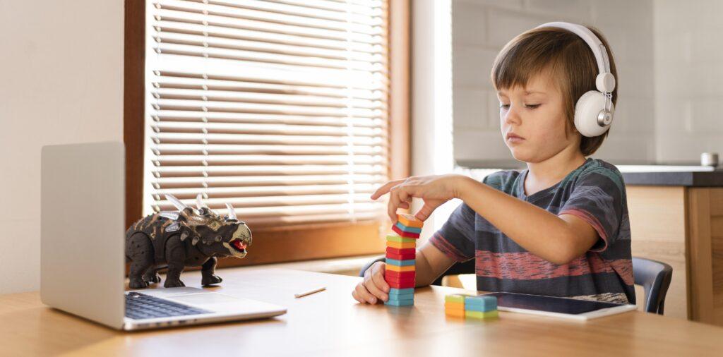 little online student playing with toys More Balanced Learning Approach